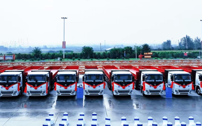 百台交付，，千台签约！！200台OK138太阳集团官网新能源纯电动重卡奔赴河南